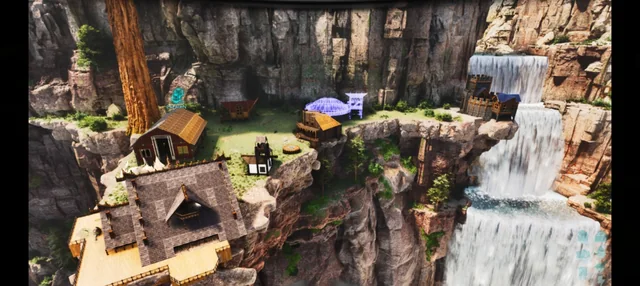 A timber base perched on a cliff beside a waterfall
